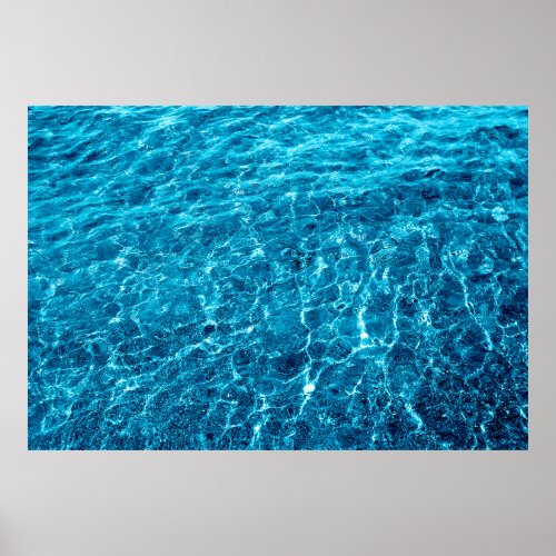 Photo of a macro bubbling blue clear sea water poster