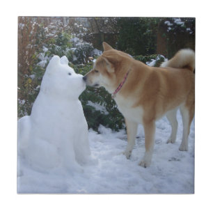 photo of cute akita kissing snowman akita dog ceramic tile