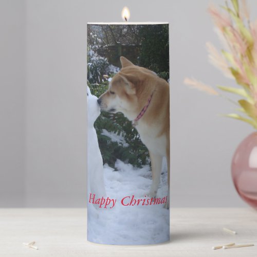 photo of cute dog kissing snowman dog pillar candle