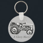 photo of vintage Gray massey fergison tractor Keychain<br><div class="desc">The original photograph of this old vintage tractor on this key chain was taken at the Epping forest Festival. The massey fergison gray tractor on was used on farms many years ago. The tractor picture captures an image when farm machinery was a lot smaller than the massive machines seen and...</div>