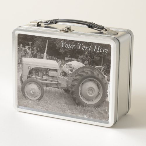 photo of vintage gray massey fergison tractor  metal lunch box