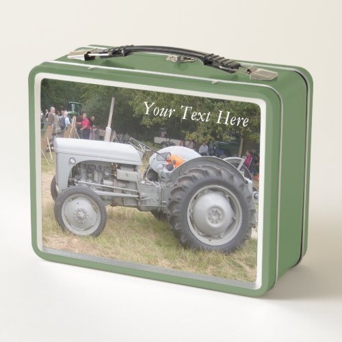 photo of vintage gray massey fergison tractor  metal lunch box