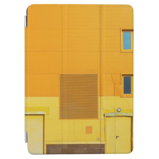 PHOTO OF YELLOW AND WHITE PAINTED WALL iPad AIR COVER