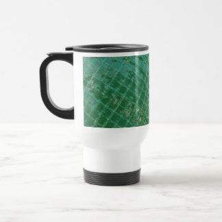 Photo picture of green plastic cover. travel mug