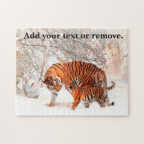 Photograph of a tiger and cub playing in the snow jigsaw puzzle