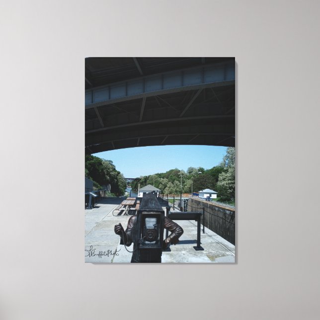 Photographer Statue with Erie Canal in Background Canvas Print (Front)