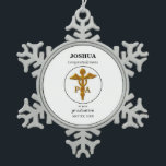 Physician Assistant Graduation Congratulations Snowflake Pewter Christmas Ornament<br><div class="desc">Many years of school, hard work and dedication go onto the graduation as a PA. This is the perfect gift and souvenir item to congratulate a man or woman on their graduation as a Physician Assistant. The PA symbol is digitally rendered antique gold. It looks 3D and is framed with...</div>