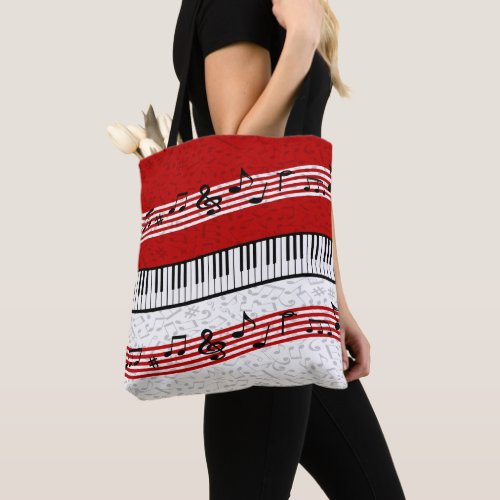 Piano and music score red tote bag