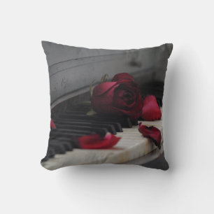 Piano Keys with a Red Rose Throw Pillow