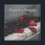 Piano Keys with a Red Rose Wedding Magnet<br><div class="desc">Artistic looking photo of an old piano focusing on the old yellowing keys with a faded red rose sitting on the keys and a few loose petals scattered about. This image has a somewhat melancholy and sentimental mood with a little bit of a nostalgic feel. Customize with the bride and...</div>