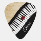 Piano keys with sheet music Guitar pick