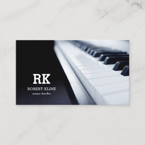 Piano Music Teacher Business Card - Professional music teacher business cards featuring a elegant piano keys, initials, name, job title, and contact information.