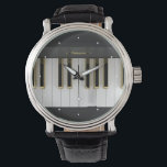 Piano Watch<br><div class="desc">A piano keyboard with white and golden keys.</div>