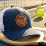 Pickerball club leather patch hat<br><div class="desc">The design showcases a timeless "Club Emblem" aesthetic, featuring a pair of crossed pickleball paddles and a ball, encircled by bold, vintage-inspired typography. Perfect for players who appreciate a retro, collegiate, or country-club aesthetic. It is fully customizable, allowing you to add your own name, club name, or year established to...</div>
