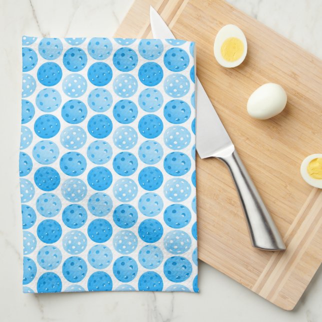 Pickleball Balls - Blue Pickleball Balls on White Kitchen Towel (Quarter Fold)