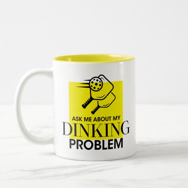 Pickleball humor, Ask me about my dinking problem. Two-Tone Coffee Mug (Left)