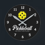 Pickleball lover wall clock with funny quote<br><div class="desc">Pickleball lover wall clock with funny quote. Custom round time clock with yellow ball logo and script text. Fun Birthday party gift idea for fan, player, sports coach, dad, mom, wife, husband, teenager etc. Change ball logo and background into any color. Personalize with your own funny quote or club name....</div>