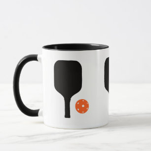 Pickleball paddle & orange pickleball mug