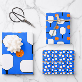 Pickleball Paddles, Orange Pickleball Balls, Blue Wrapping Paper Sheets