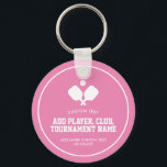 Pickleball Party Paddles Pink White Custom Keychain<br><div class="desc">Super fun pickleball keychain. Design features 2 crossed white pickleball paddles and a ball. Easily add your custom text and change the colors too! Great for an adult pickleball birthday party favor, pickleball weekend gathering, getaway, pickleball club party, special event, fundraiser, tournament, hostess gift or everyday fun. Pickleball - the...</div>