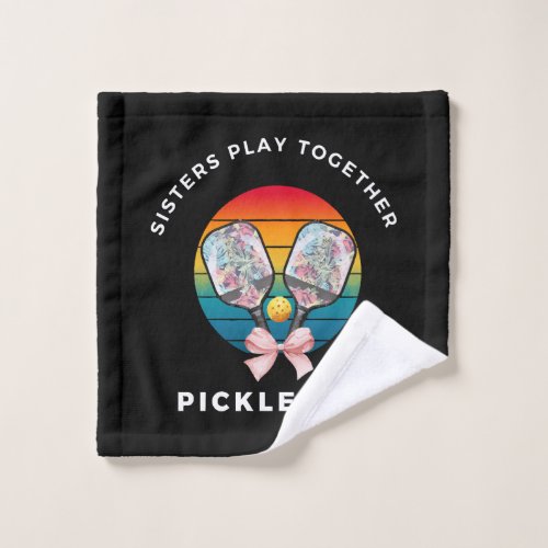 Pickleball sisters play together wash cloth