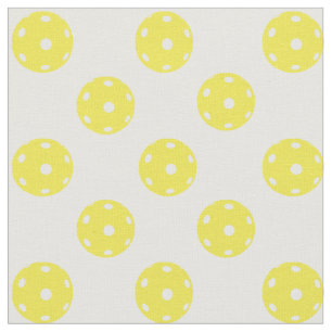 Pickleballs on white fabric