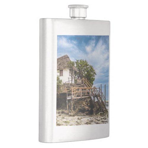 Picturesque house on a tropical coral outcrop flask