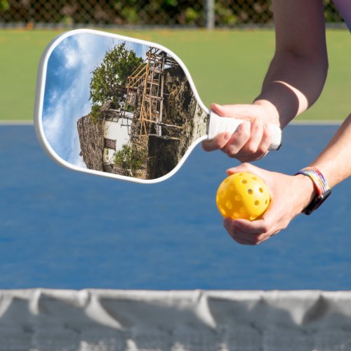 Picturesque house on a tropical coral outcrop pickleball paddle