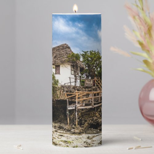 Picturesque house on a tropical coral outcrop pillar candle