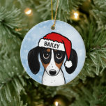 Piebald Dachshund Santa Wiener Dog Custom Name Ceramic Ornament<br><div class="desc">An adorable piebald Dachshund Christmas ornament that can be personalized with your own text. Add name for a fun custom gift. Makes a treasured ornament to display on the Christmas tree for years to come. Visit Jenn’s Doodle World for even more holiday gifts with this cute wiener dog design and...</div>