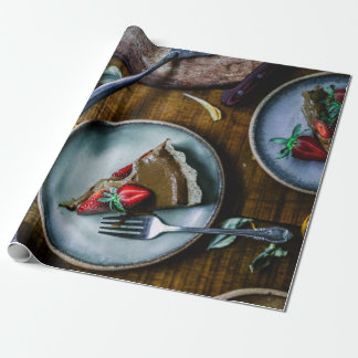 PIECE OF CAKE SERVED ON ROUND GRAY CERAMIC PLATE WRAPPING PAPER