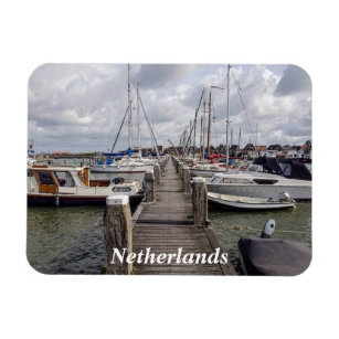 Pier with boats and yachts in Marken Netherlands M Magnet