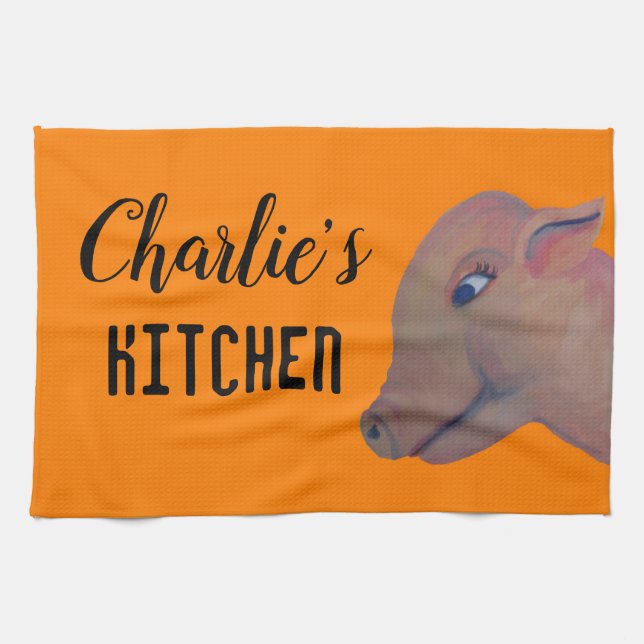 pig on orange kitchen towel (Horizontal)