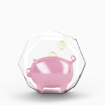 Piggy bank and coins award<br><div class="desc">Inserting golden coins into a piggy bank</div>