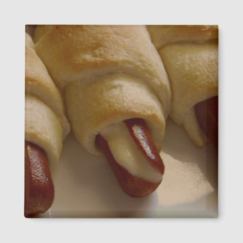 Pigs in a blanket with cheese magnet