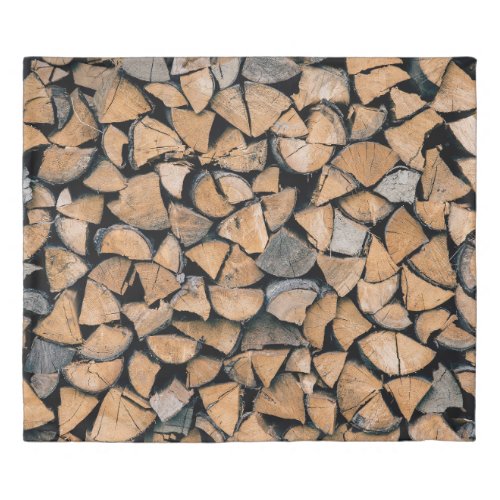 Pile of brown firewood duvet cover