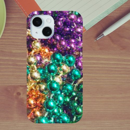 Pile of Mardi Gras Beads Sparkling in Light iPhone 15 Case