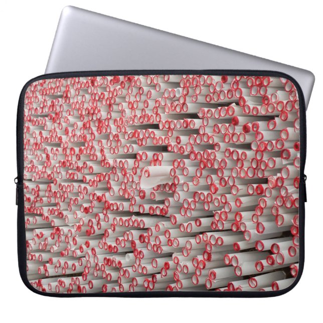 Pile of rolled papers laptop sleeve (Front)
