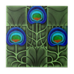 Pilkington Lewis Day Peacock Feather c1900 Repro Ceramic Tile<br><div class="desc">This tile is reproduced from an original antique tile in our personal collection. Usually this peacock feather tile, designed by Lewis F. Day for Pilkington, is one color. However, this tile is green with royal or cobalt blue, turquoise, and orange eyes. These tiles are highly collectible and make great wall...</div>