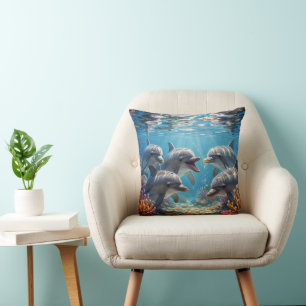 Pillow with dolphins.