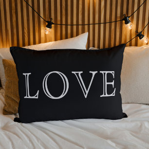 Pillow With White Love Word On Black Background