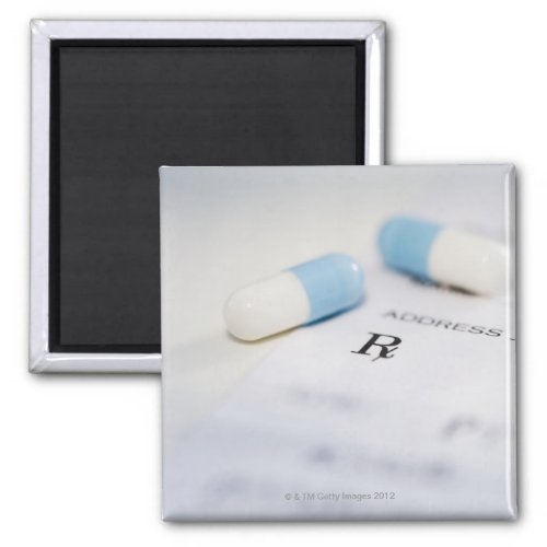 Pills on written prescription magnet