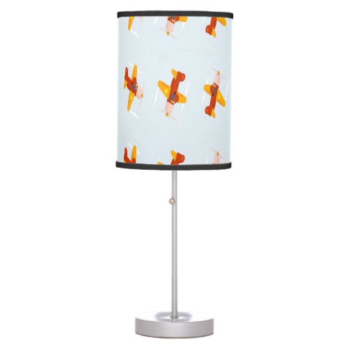 Pilot flying plane in the sky table lamp