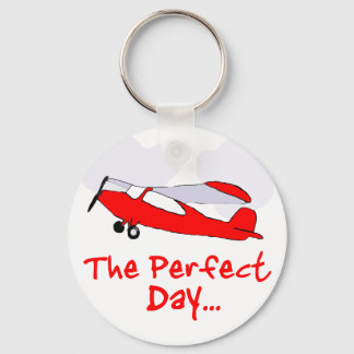 pilot flyling red airplane keychain