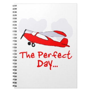 pilot flyling red airplane notebook