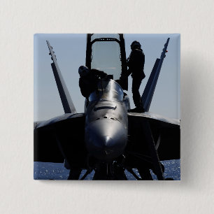 Pilots conducts a pre-flight inspection button