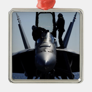 Pilots conducts a pre-flight inspection metal ornament