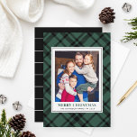 Pine Green Tartan Plaid Merry Christmas Photo Holiday Card<br><div class="desc">Festive winter plaid photo card features a favorite vertical photo framed by a classic yet modern hunter green / pine green and black Scottish tartan plaid patterned background. Personalize the custom "Merry Christmas" text with your preferred wording, family name, and the year. A coordinating pattern of sleek black and white...</div>