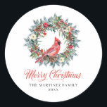 Pine Holly Wreath Cardinal Christmas Classic Round Sticker<br><div class="desc">Traditional Christmas design includes a pine and holly wreath with pine cones and flowers. A red cardinal sits in the center. Merry Christmas,  written in a beautiful calligraphy is placed below.</div>
