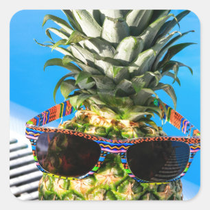 Pineapple wearing sunglasses at swimming pool square sticker